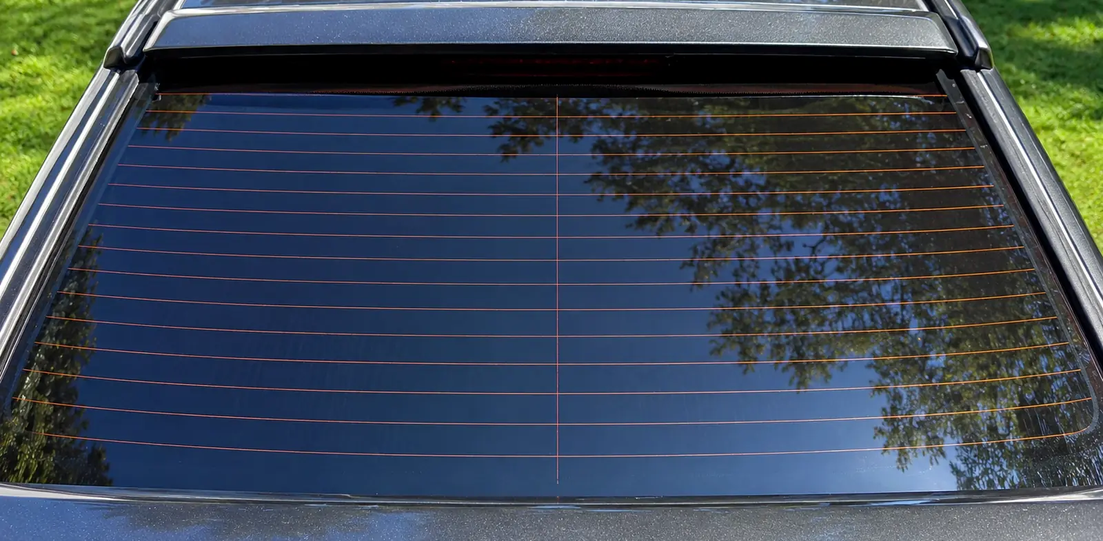 The STI's rear window, where supporter names go